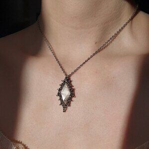 Silver and quartz whimsical fairy necklace with a small silver chain